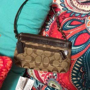 Small coach wristlets